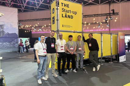 Gründer vor dem INSPIRE BW-Stand auf dem START Summit in St. Gallen